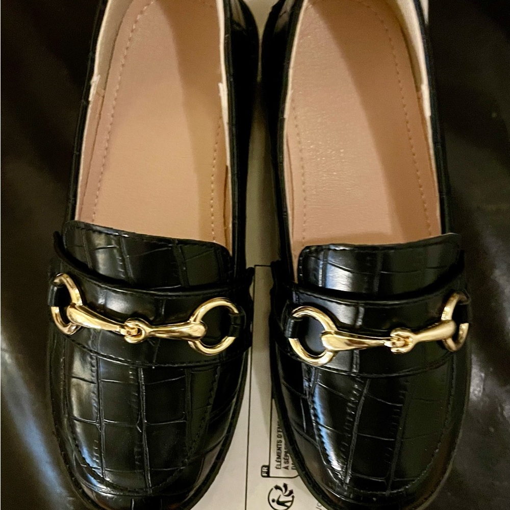 Elegant Black Loafers with Gold Accent